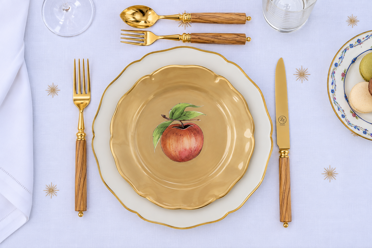 Z.d.G. Le Potager du Roi Stardust embroidered white linen tablecloth set on an outdoor table with desserts and wheat sheaves.