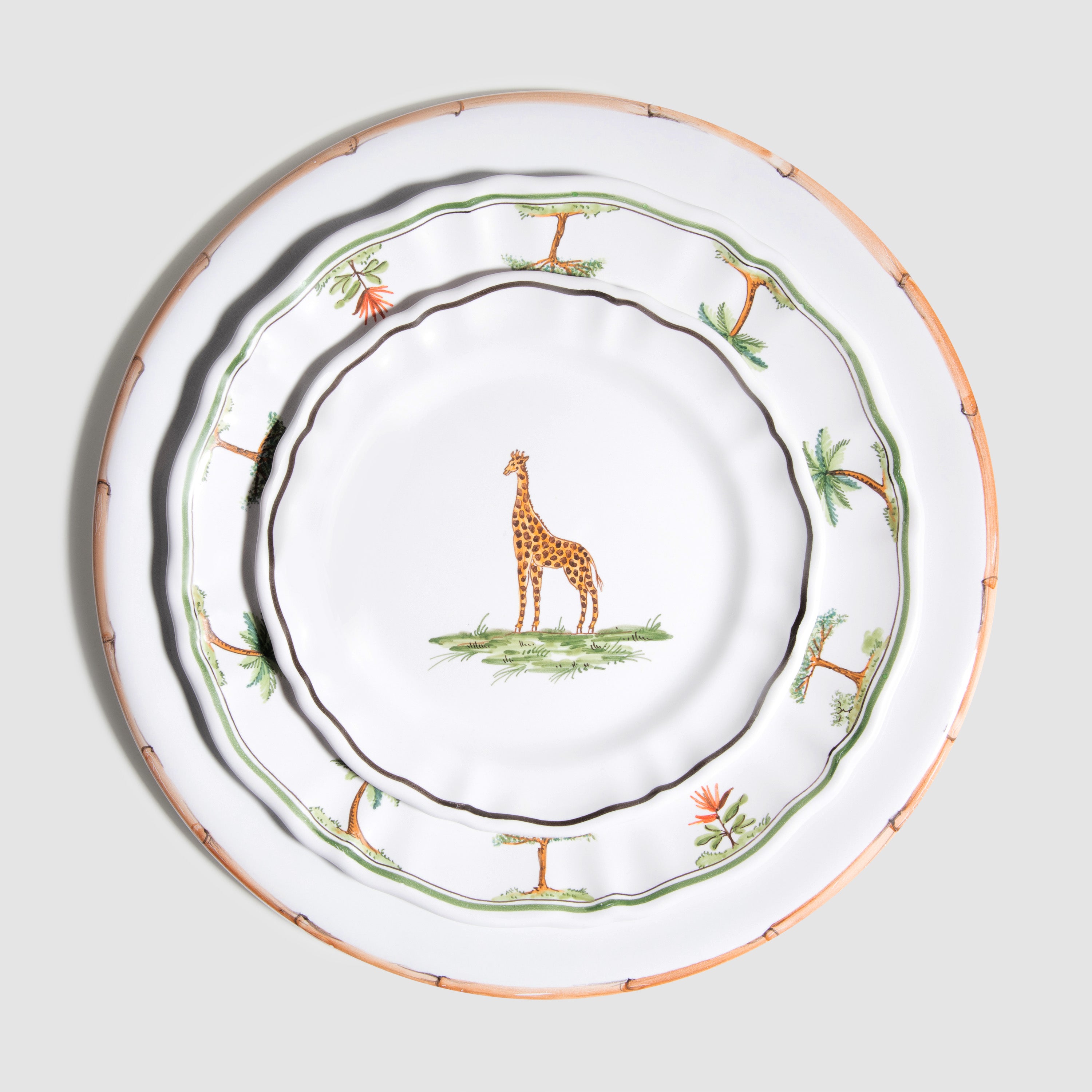Animaux de la Savane Dessert/Side Plate styled ontop of La Savane Dinner Plate and Bamboo Charger Plate