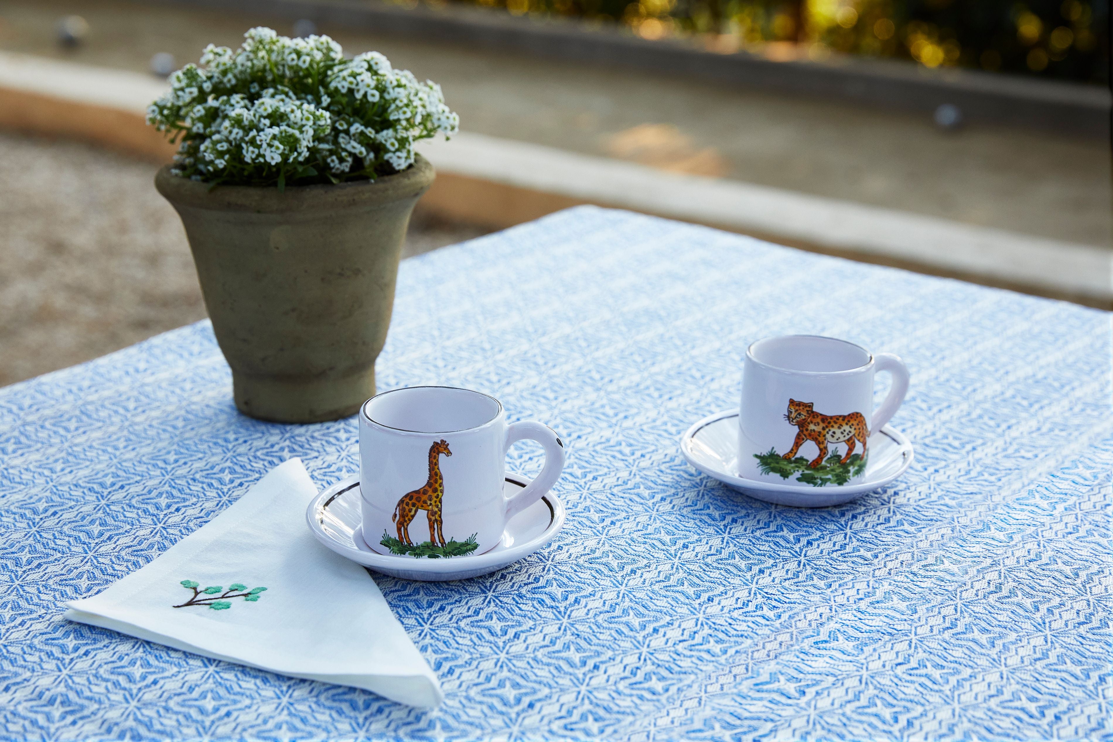 Animaux de la Savane Pair of Espresso Cups & Saucers, Giraffe styled on a table 