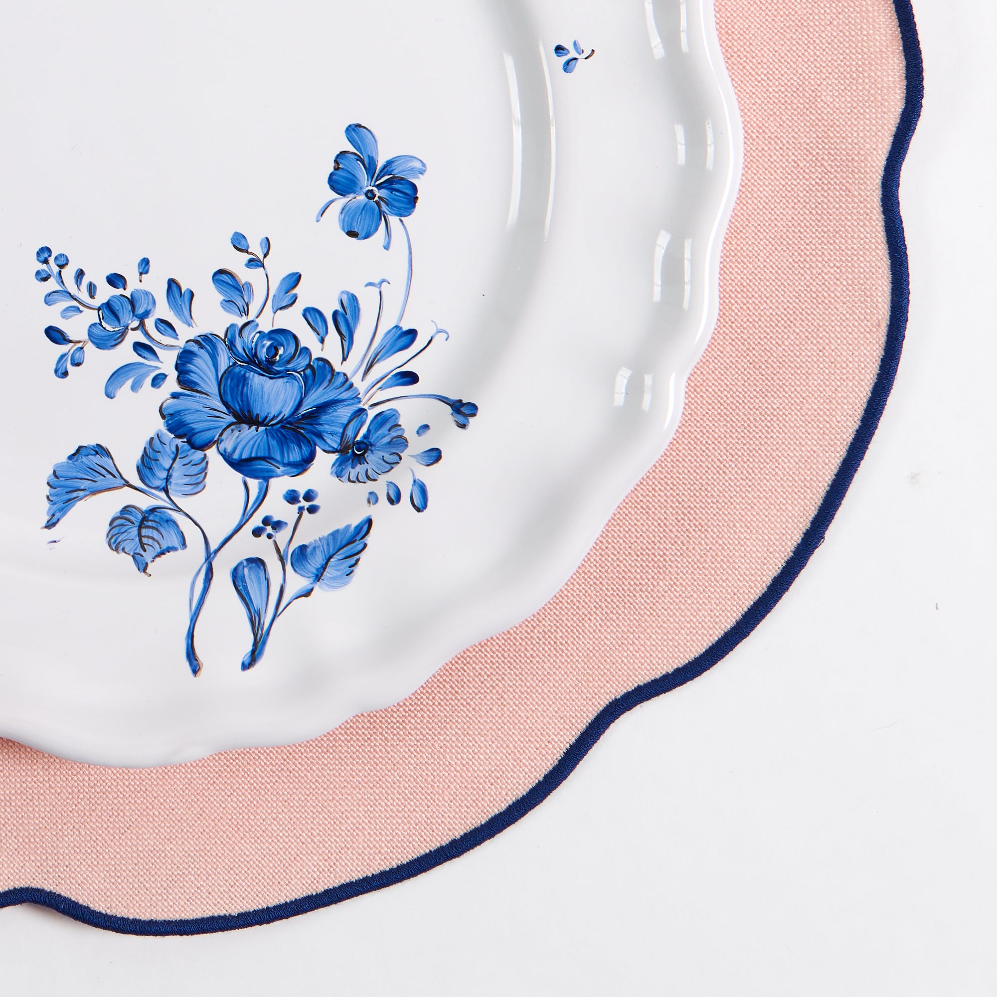 close up detail of Coated Pink Linen Placemat, Blue