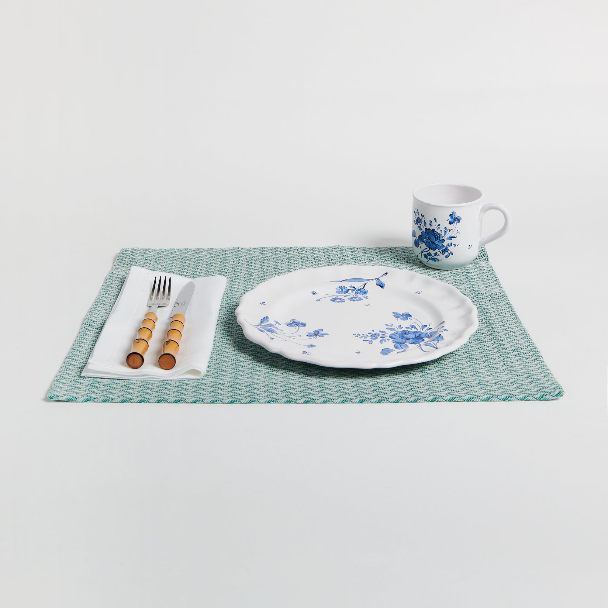 table setting with Emerald Green Rectangular Jacquard Placemat