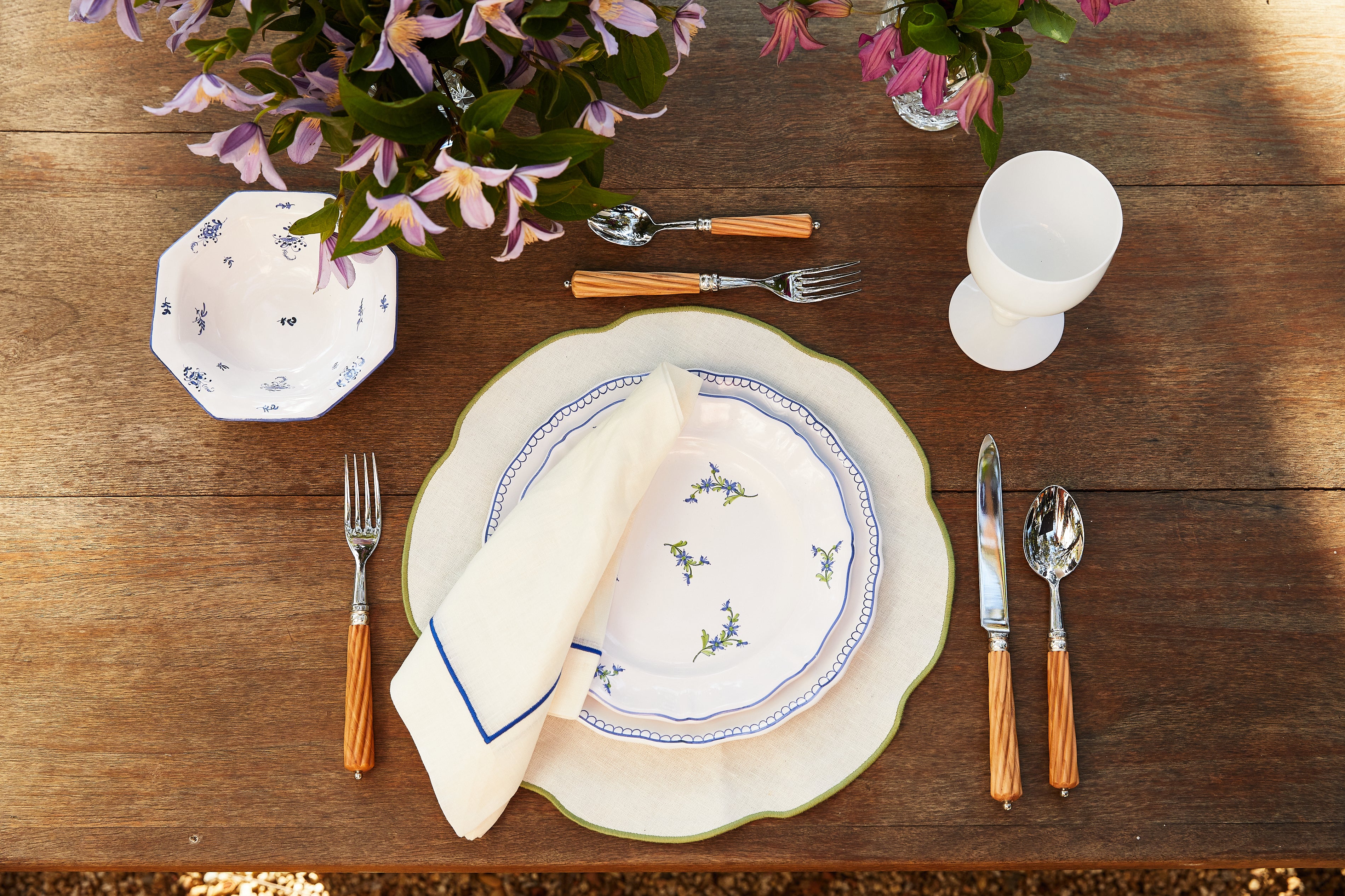 styled table setting with Coated White Linen Placemat, Pistache